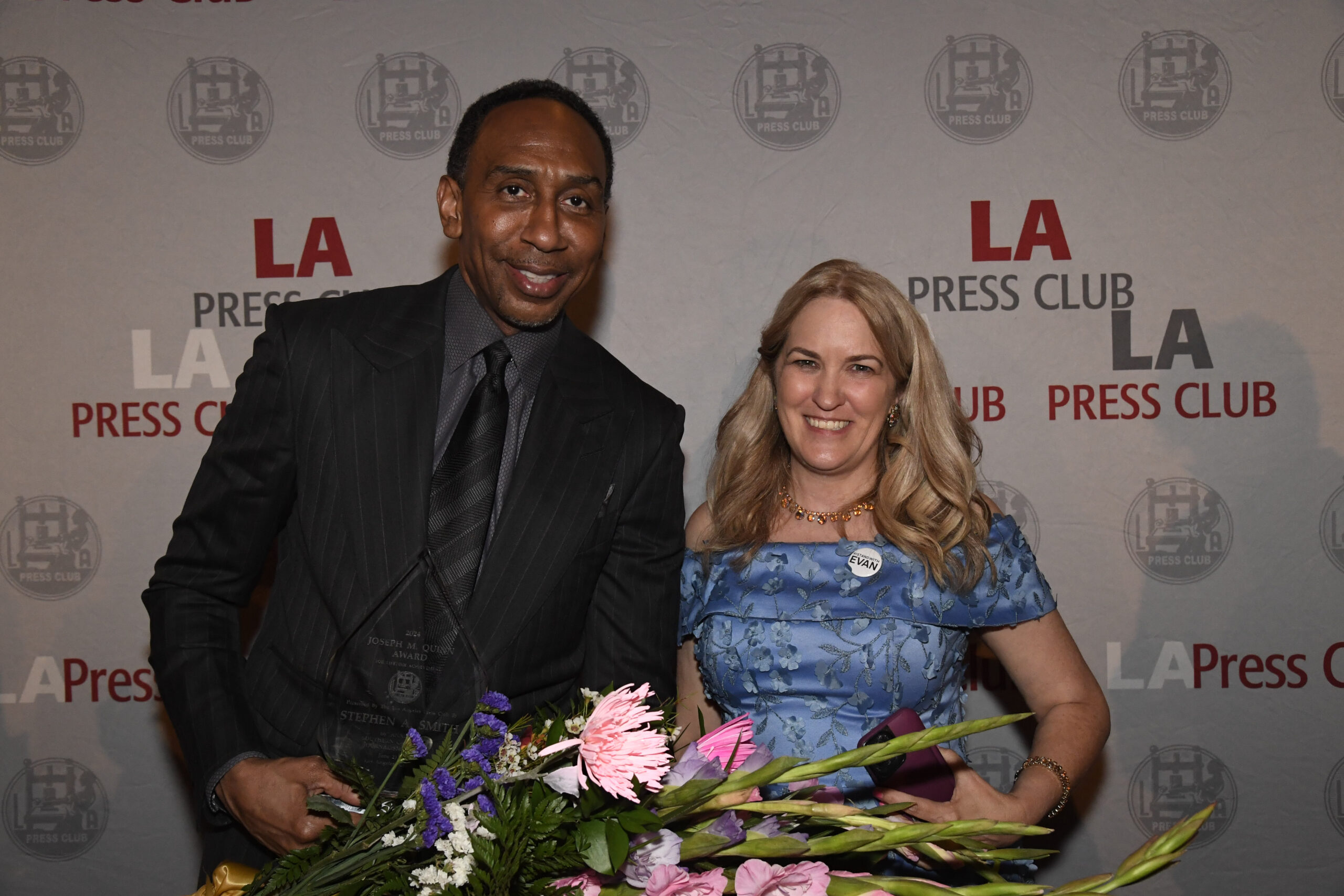 LA Press24B-382 Stephen A. Smith, 2024 recipient of the Joseph M. Quinn Award for Lifetime Achievement, poses for a photo alongside former LAPC president Lisa Richwine at the 66th Southern California Journalism Awards gala in downtown Los Angeles. Photo by Betsy Annas.